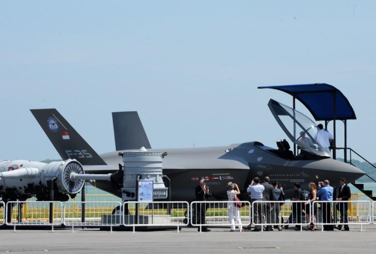 A replica of an F 35 Lightning-II with Singaporean fin flashes at the 2014 Singapore Air Show.